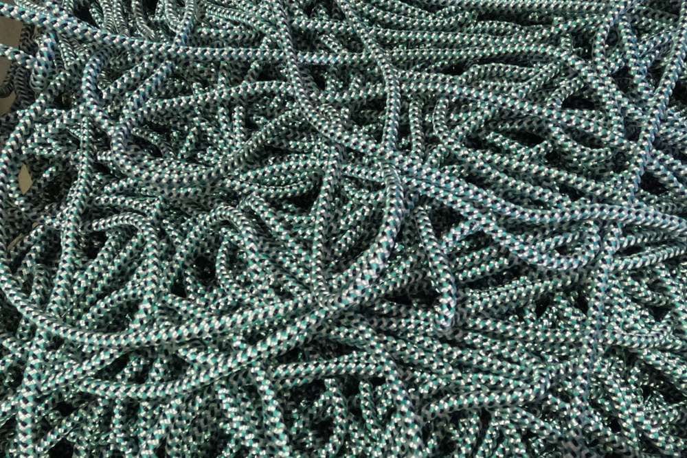 6 mm Braided Lead Core Rope in a tangled arrangement, showcasing its durable and high-quality braided design.