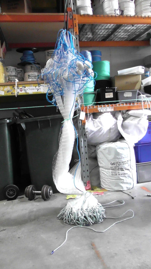 2-1/2 inch  0.50mm x 25md and 40md x  20m 30m 40m 60m 100m Mullet net hanging in a storage area.