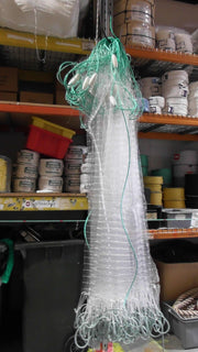 3-00 inch 30m 40m 60m 100m 0.50mm x 20md mullet net hanging in storage, featuring strong 30lb nylon mesh and floats.