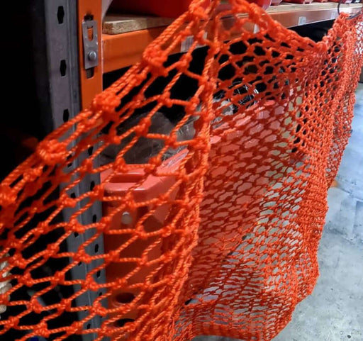 Cray Pot Mesh 60ply 3inch 20MD Orange per meter hanging on display, showcasing its strong, durable, heavy-duty quality.
