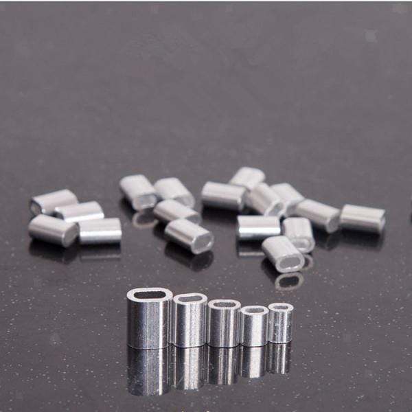 Small Mini Alli Crimps 0.8mm to 1.5mm x 1000pcs displayed on a shiny surface, showing various sizes of crimp sleeves.