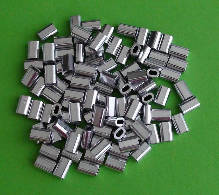 Mini Aluminium Single Sleeve Crimp 0.8m 1mm 1.2mm 1.3mm 1.5mm x 100pcs - a collection of shiny aluminum crimps on green background.