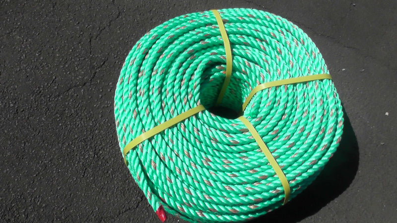 Green Polypropylene rope 12mm x 220m Coil, durable and secure for heavy-duty tasks.