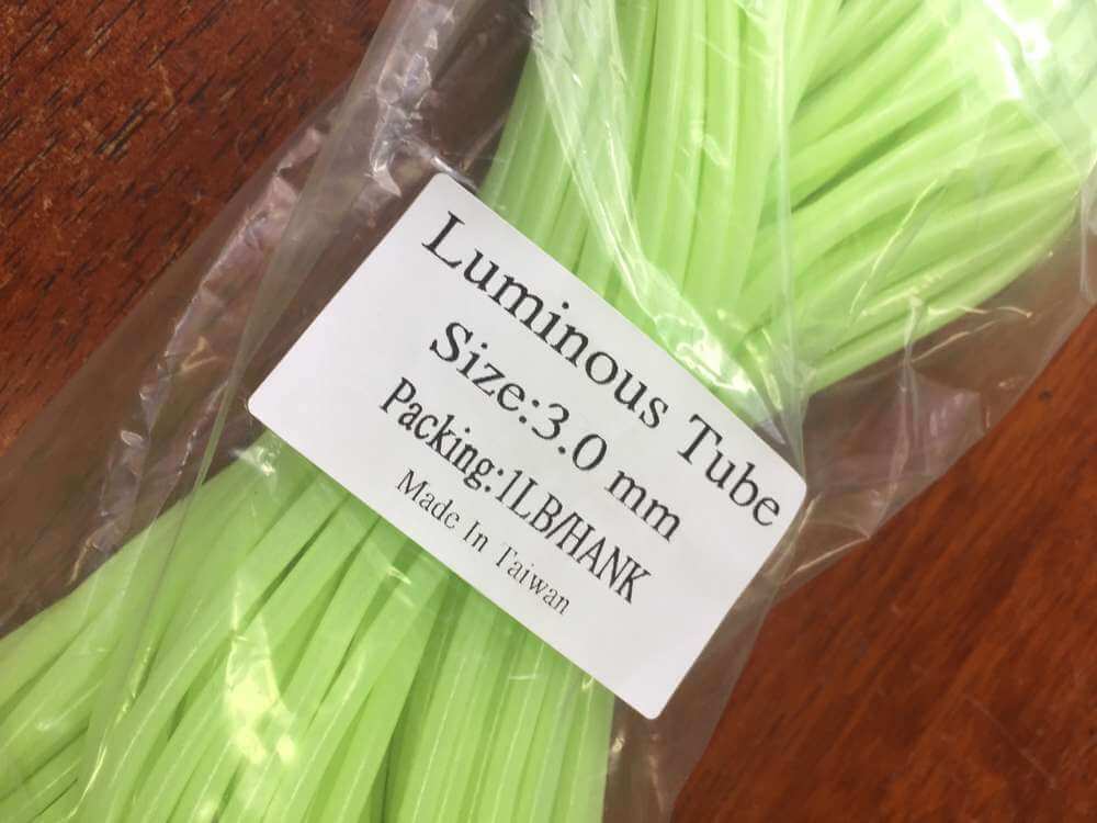 Luminous Green Tubing 2.3mm x 31m packaging details including size and weight information.