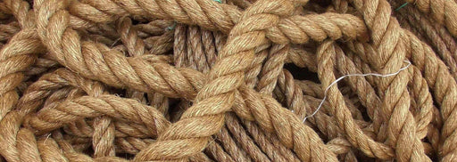 Special Manila Rope 18mm x 174 meter long displayed in tangled form, showcasing its quality and texture.