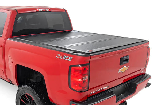 Hard Tri-Fold Flip Up Bed Cover Chevy/GMC 1500/2500HD/3500HD (14-19) by Magwarehouse.com