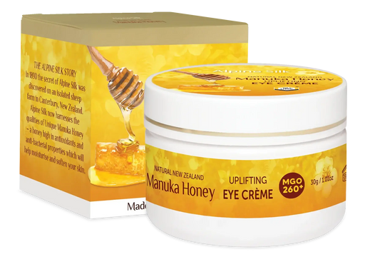 Alpine Silk Manuka Honey Eye Cream 30g in a jar with packaging featuring honey and natural ingredients.