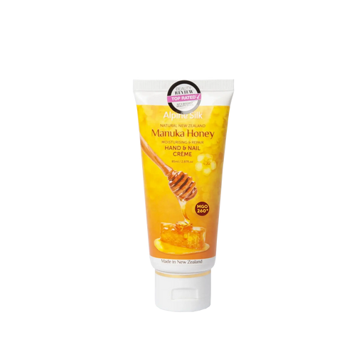 Alpine Silk Manuka Honey Hand & Nail Cream 85ml tube with honey dripping, nourishing for hands and nails.