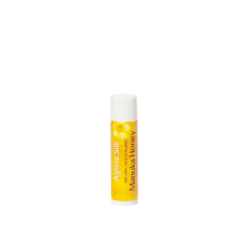 Alpine Silk Manuka Honey SPF15 Lip Balm 4.5g in a yellow tube for nourishing lip care.