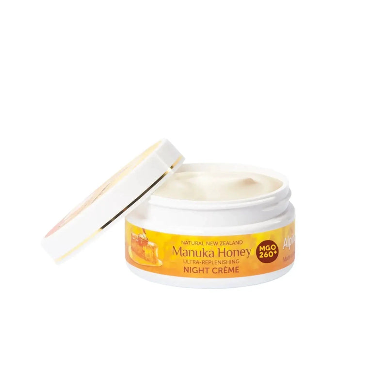 Alpine Silk Manuka Honey Night Cream 100g in a jar with opened lid, showcasing the cream inside.