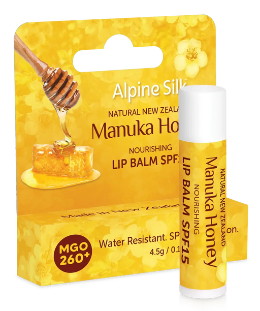 Alpine Silk Manuka Honey SPF15 Lip Balm 4.5g in packaging with honeycomb and honey dipper.