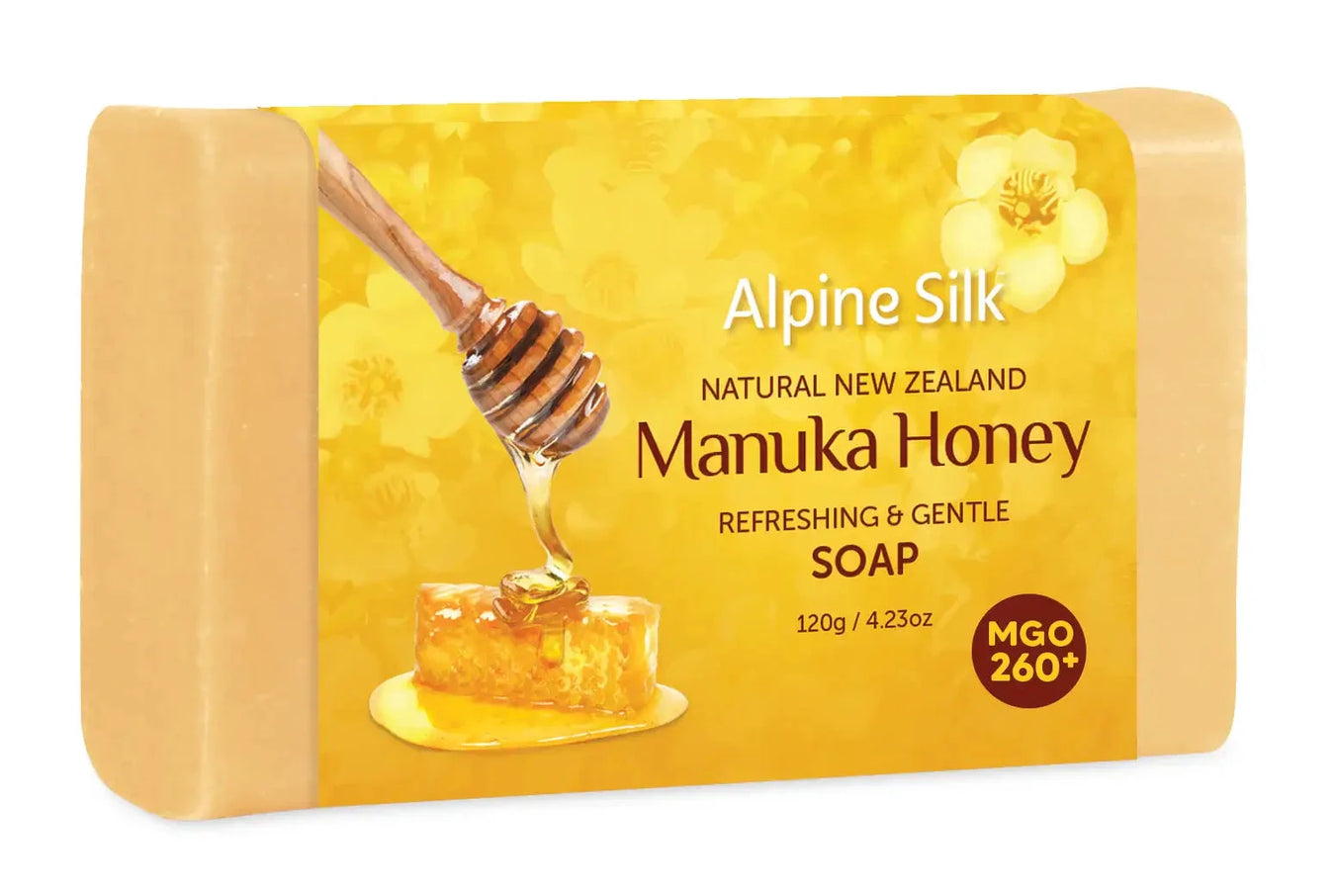 Alpine Silk Manuka Honey Soap 120g bar with honey dipper and floral design, refreshing and gentle for all skin types.