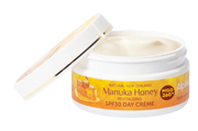 Alpine Silk Manuka Honey SPF30 Day Cream 100g jar with lid open, showcasing the creamy texture inside.