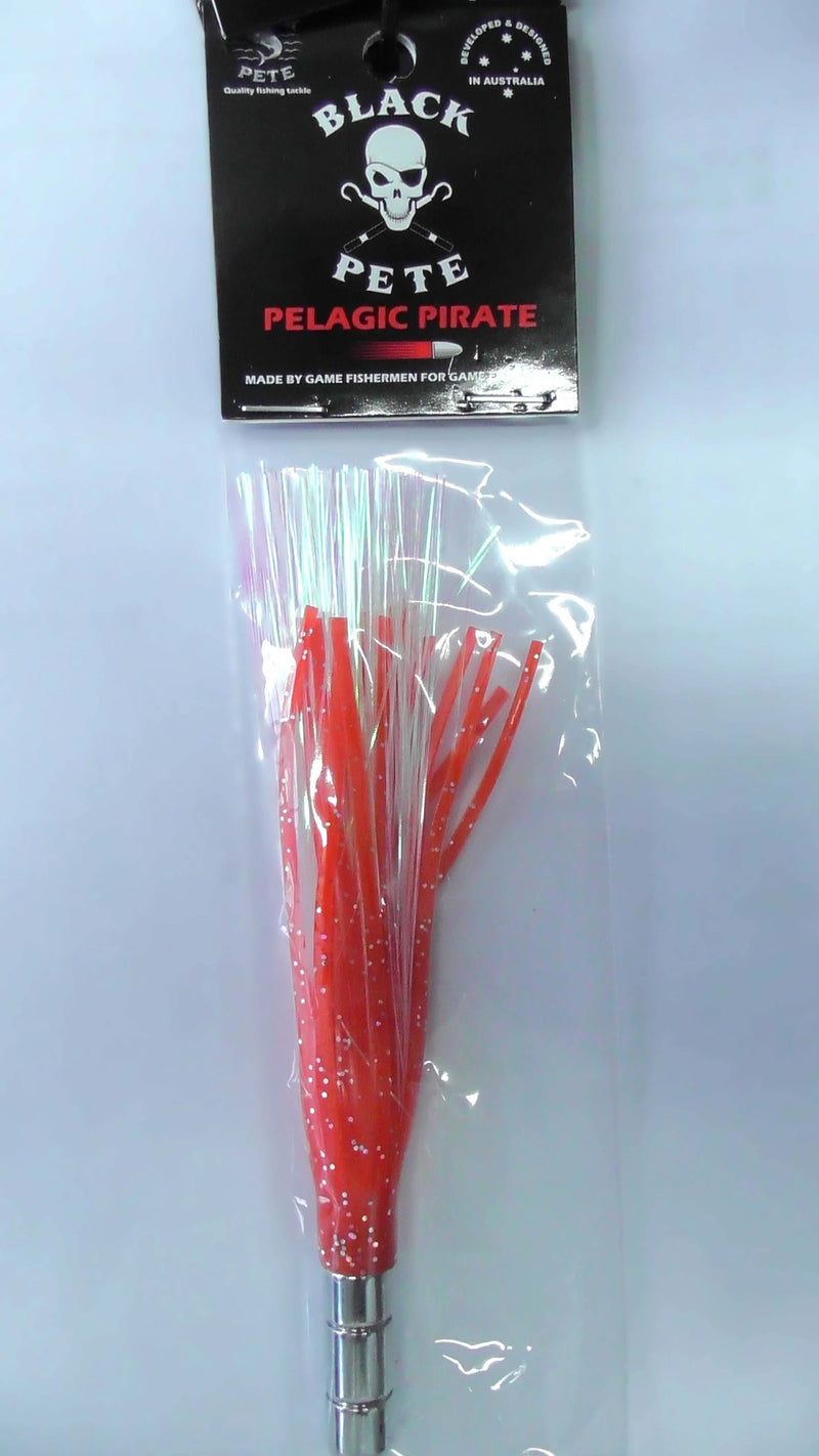 Black Pete Pelagic Pirate F-Skirt 5.5" Lure in packaging with vibrant skirt and silver accents.