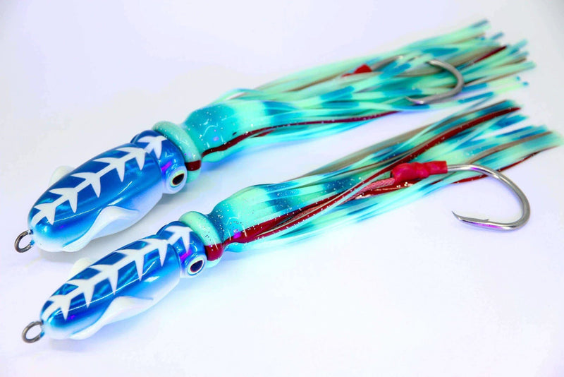 750g Catch Squidwings Blue Glow lures showcasing bright colors and glow-in-the-dark features for deep water jigging.