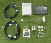 Multi Control Panel Kit PC180 components including control panel, cables, connectors, and accessories on green grass.