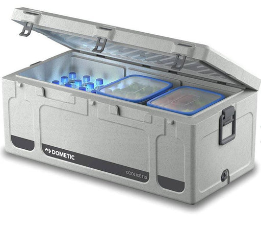 Dometic 92 Litre Cooler Box opened, showcasing bottles and containers inside for efficient cooling.