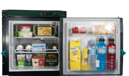 Engel Upright Fridge-Freezer 57 Litre with shelves holding various beverages and food items.