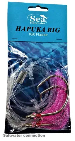 Hapuka rig 16/0 flasher hooks, two stainless steel circle hooks in packaging with clear and pink flashers.