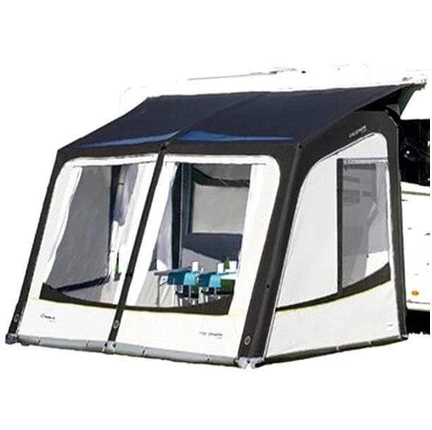 naca Atmosphere Inflatable Awning 400 - Medium attached to a caravan providing shade and space for outdoor dining.