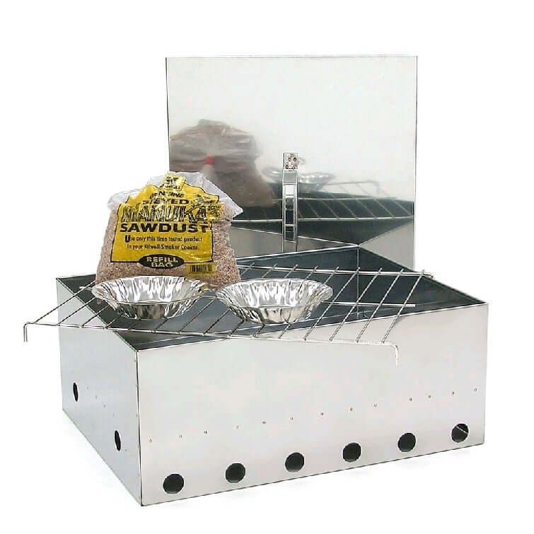 Kilwell NZ Smoker 23 Litre Magnum S/S with sawdust and two foil trays for efficient smoking.