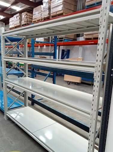 New Longspan Panel Shelving U with four levels and metal panel inserts for storage solutions.
