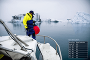 Windy Buoys & Fenders 8 Sizes Small to Large man on boat with buoy in icy waters, showcasing buoy sizing chart.