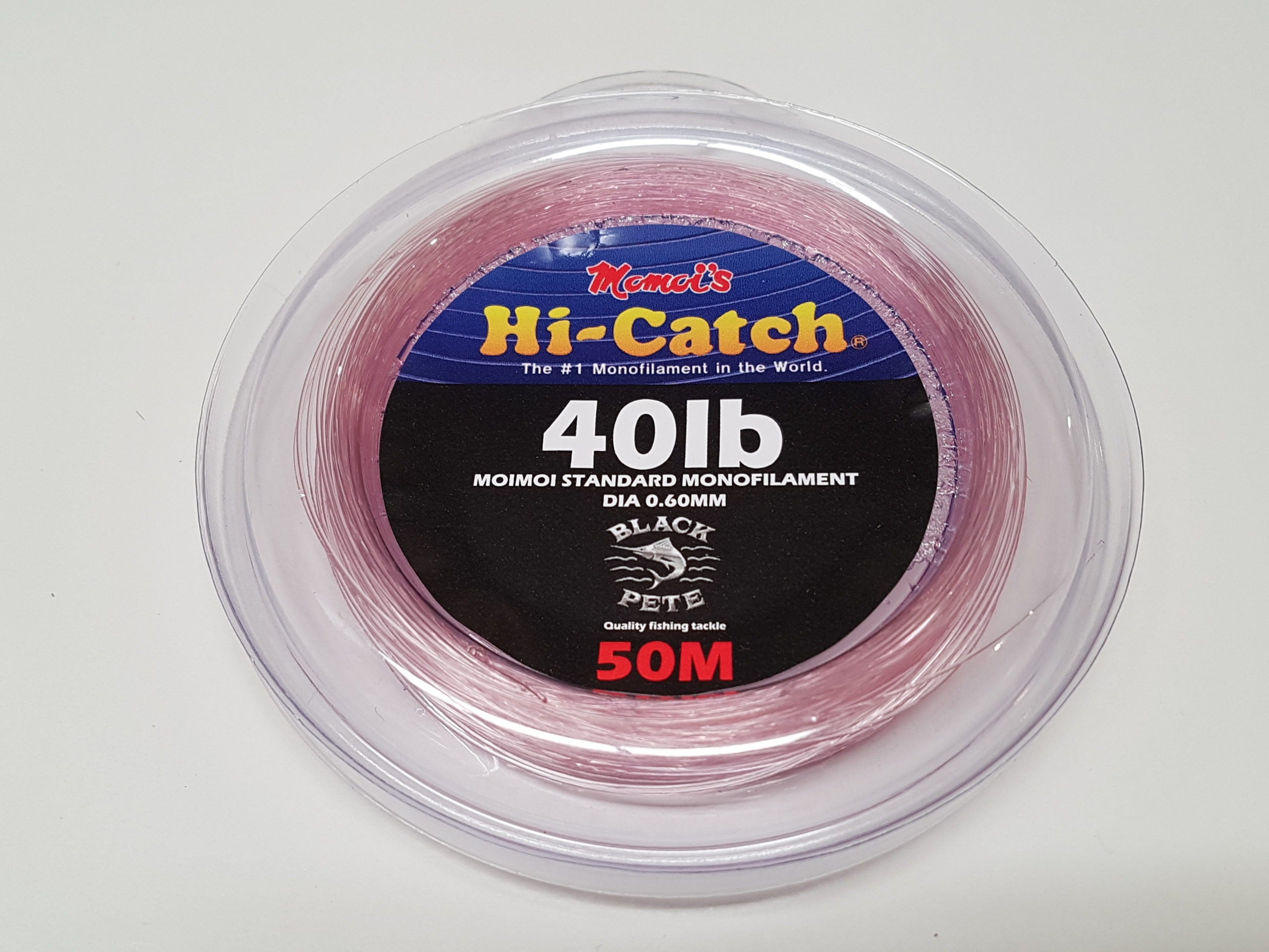 Momoi Standard Pink Monofilament Leader 50M in a round spool featuring 40lb test strength and a transparent pink color.