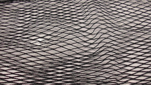 Golf Course Netting 2mmx50mmx75MDx3000ML x Bale (152m) showing black polyethylene knitted weave.