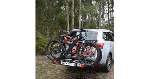 XF2 Large Fold-up/Tilting 2 Bike Rack mounted on a car, holding two bikes securely.