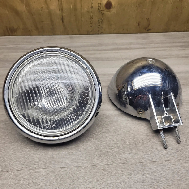 VL250 Intruder Headlight unit and cover by Motor Morgue