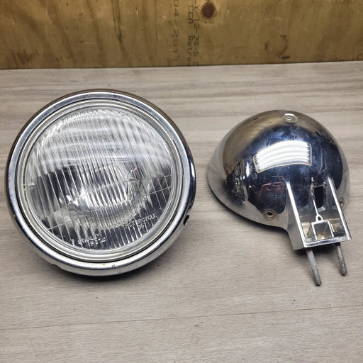 VL250 Intruder Headlight unit and cover by Motor Morgue