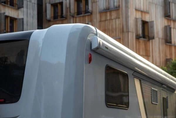 5200 ThuleWall Awning Grey 4.5m long installed on a caravan side, showcasing its sleek design and color.