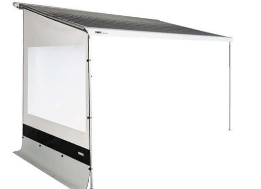 Thule Rain Blocker G2 Side Privacy Panel installed on a Thule 9200 awning, providing wind and rain protection.
