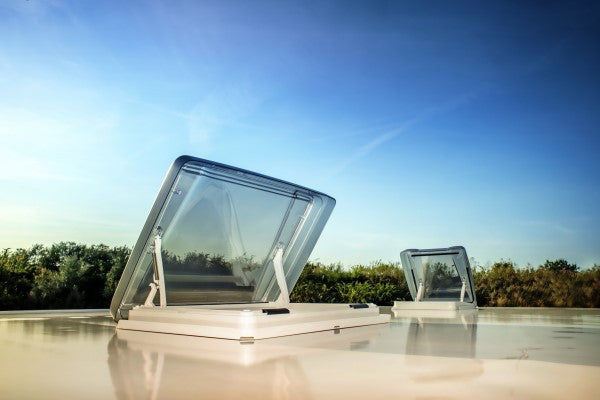 MPK Vision Star Pro roof vent 700 x 500mm - Signal White installed on a rooftop with a clear sky.