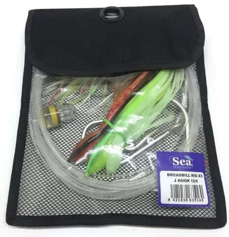 Broadbill Rig 12/0 J Hook Triple Pack in a mesh bag with various colored skirts and fishing accessories.