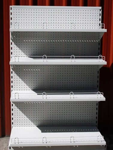 Singlesided Dairy Shelving New - Standard Kitset  Racking/Shelving with pegboard and shelves for display.