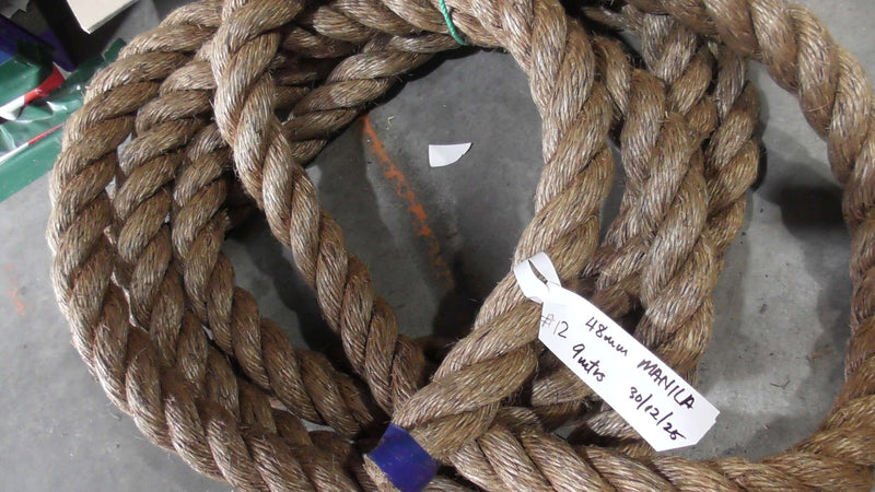 Special Manila Rope Shorts 48mm x 9 meters displayed in coils for marine and landscaping projects.