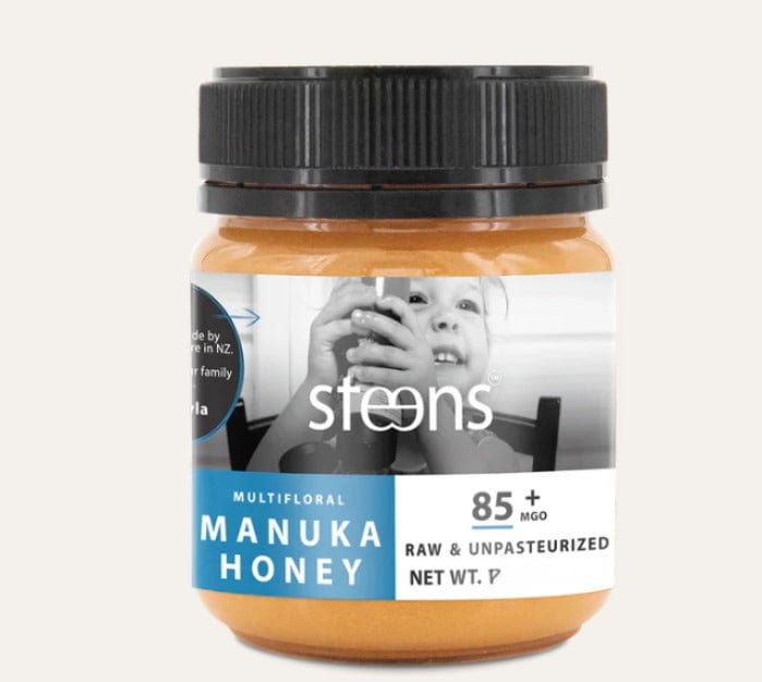 MGO 85 Raw Monofloral Manuka Honey 500g jar with label highlighting its raw and unpasteurized quality.