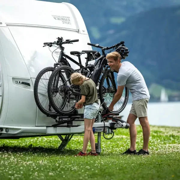 Thule Caravan Superb XT Bike Rack - Short Frame - Anodised RVP5880 with bikes mounted on a caravan.