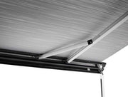 Thule 6300 Anthracite Roof Mount Awning Mystic Grey - 3.50m showcasing sturdy spring arms and awning fabric tension.