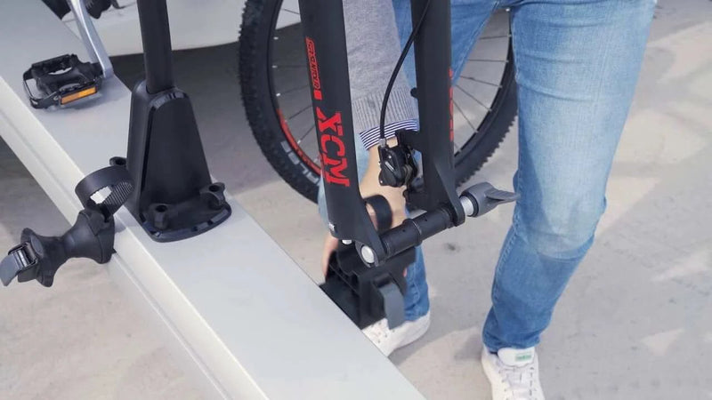 Thule VeloSlide Fork Mount Adapter - Quick Release installation process with a bicycle fork mount.