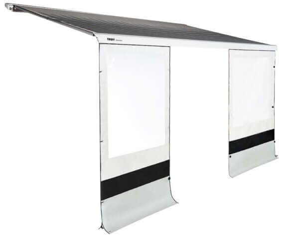 Thule Rain Blocker Front 1.72m Long x 2.3m High installed on an awning, providing wind and rain protection.