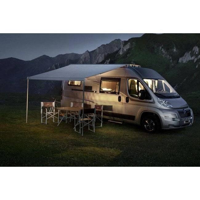 Thule 6300 White Roof Mount Awning Mystic Grey - 5.0m installed on a camper van, providing shade and outdoor space.