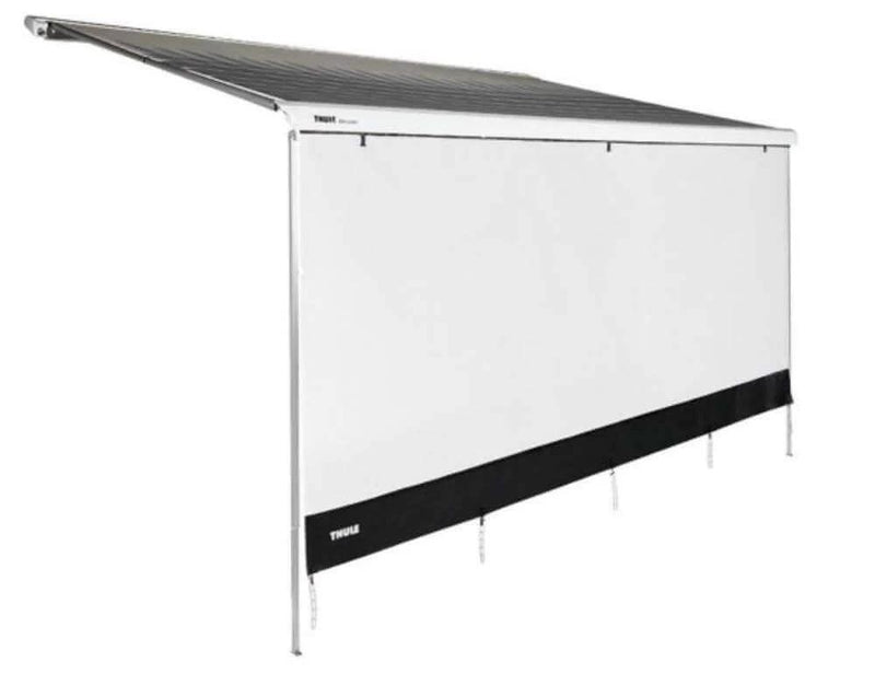Thule/Omnistor Sun Blocker 2.8m installed on an awning, showcasing transparent screen fabric for sun protection.