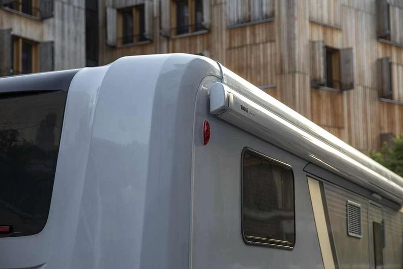 Thule 5200 Awning Mystic Grey - 2.3m Long X 1.8m Reach mounted on RV exterior.
