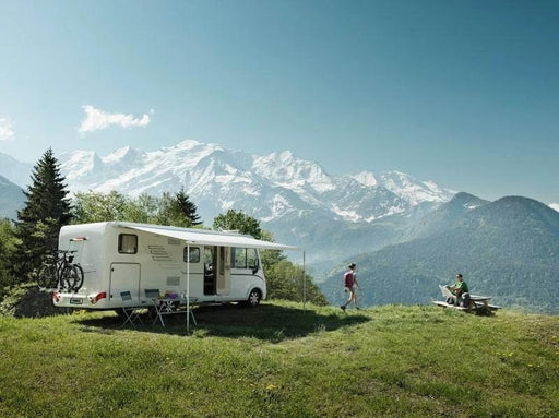Thule 8000 Awning Mystic Grey - 5.5m Long X 2.75m Reach setup at a scenic mountain campsite.