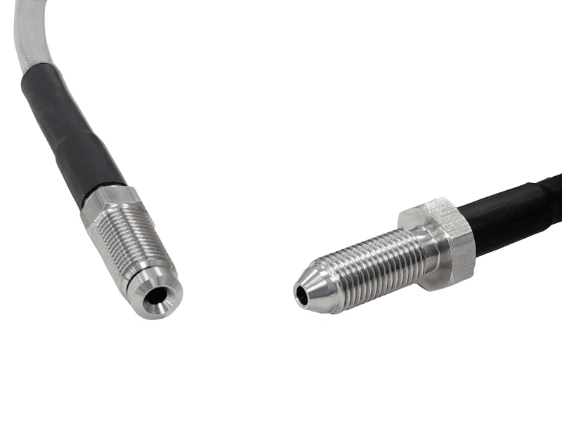 Brake Hose and Fitting Kit Single Axle S/Steel - Close-up of stainless steel fittings and hoses for hydraulic brakes.
