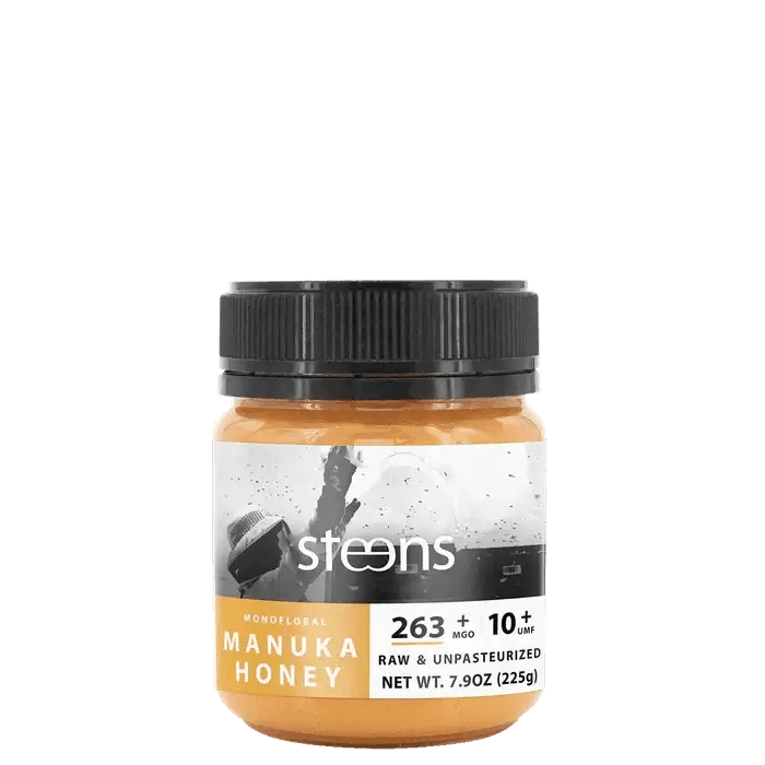 UMF 10+ Raw Multifloral Manuka Honey 225g jar with nutrition facts and branding.
