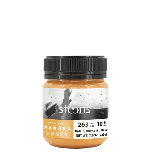 UMF 10+ Raw Multifloral Manuka Honey 225g jar with nutrition facts and branding.